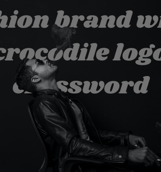 fashion brand with a crocodile logo crossword